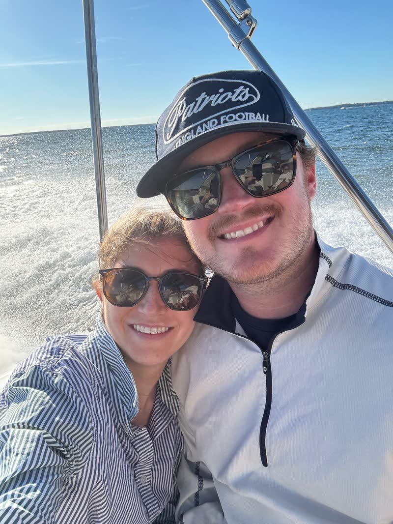 Chad and Anna on a boat