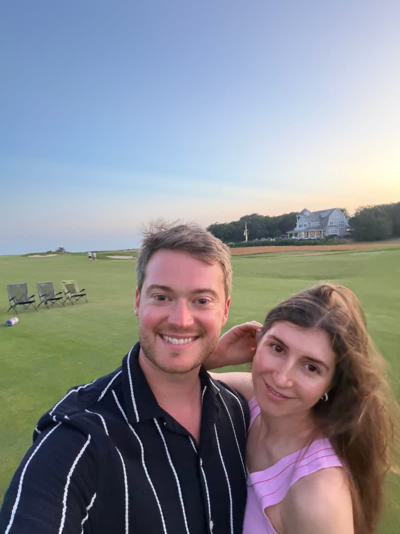 Chad and Anna selfie at sunset on the golf course