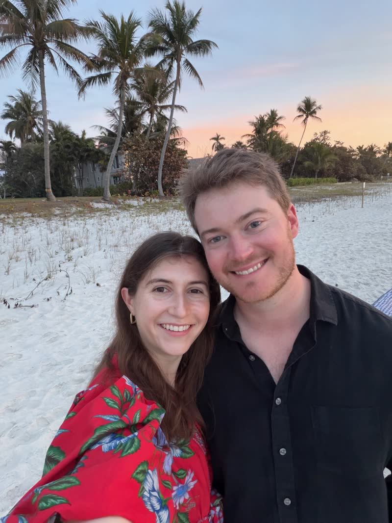 Chad and Anna on the beach at sunset